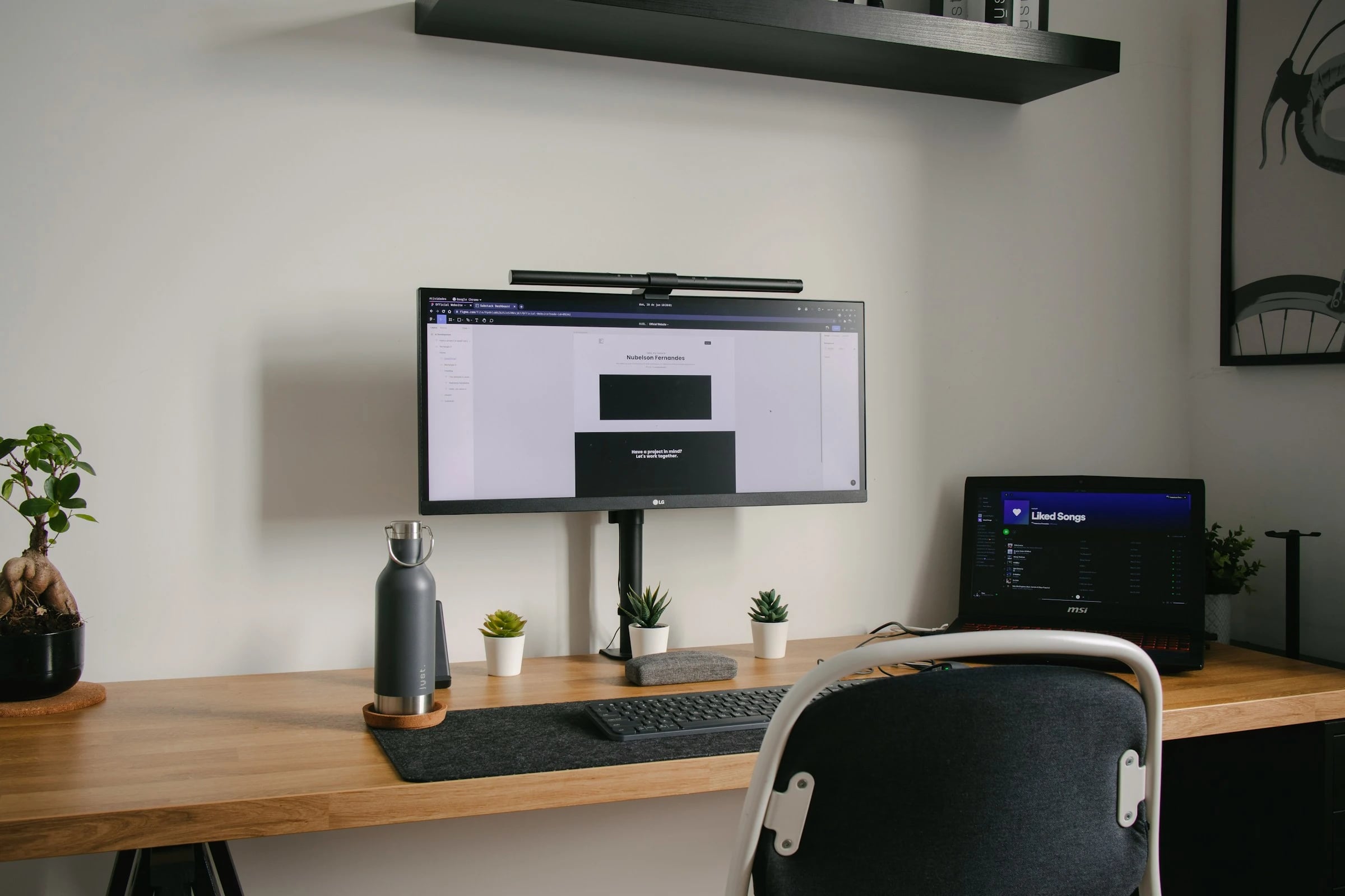 Workspace with a web design and development project in progress, showing a modern UI layout with code and design tools on screen.
